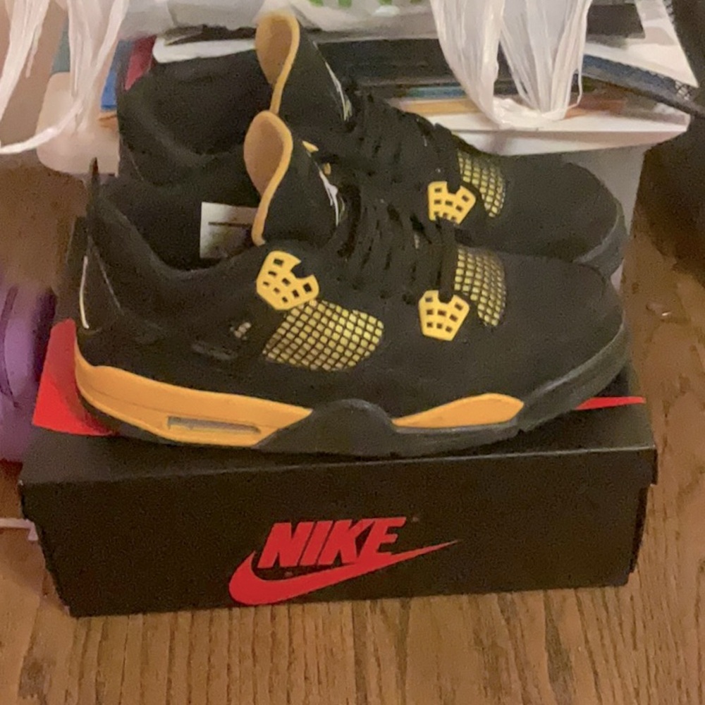Jordan 4s black and yellow